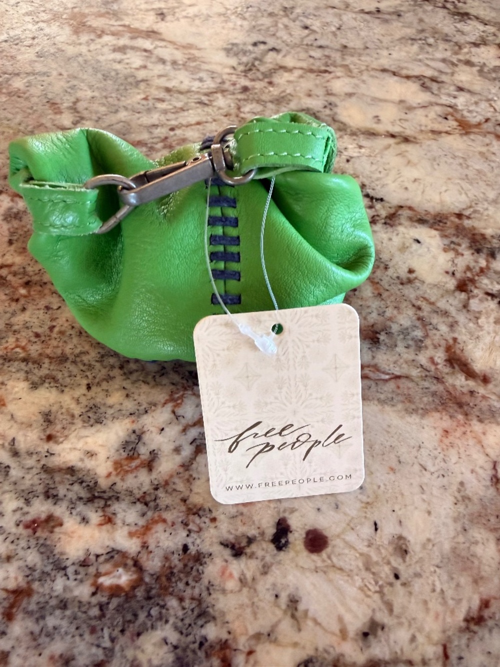 Free People roll top mini clip bag. New with tags leather green.